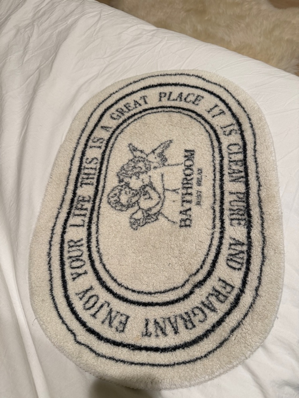 Bathroom Oval Cream Bath Mat with Navy Script